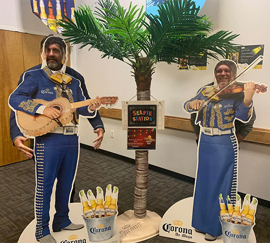 Cardboard cutouts of mariachi band Corona promo